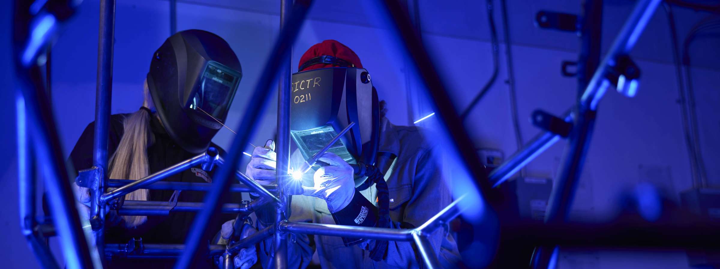 Two students work on a project in a Student Innovation Center lab