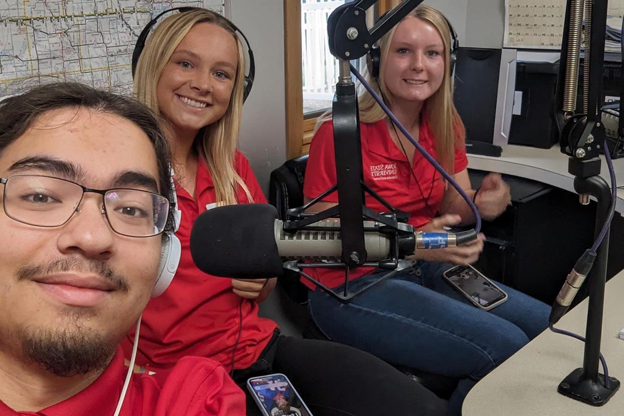 Three Rising Star interns pose during a podcast recording session.