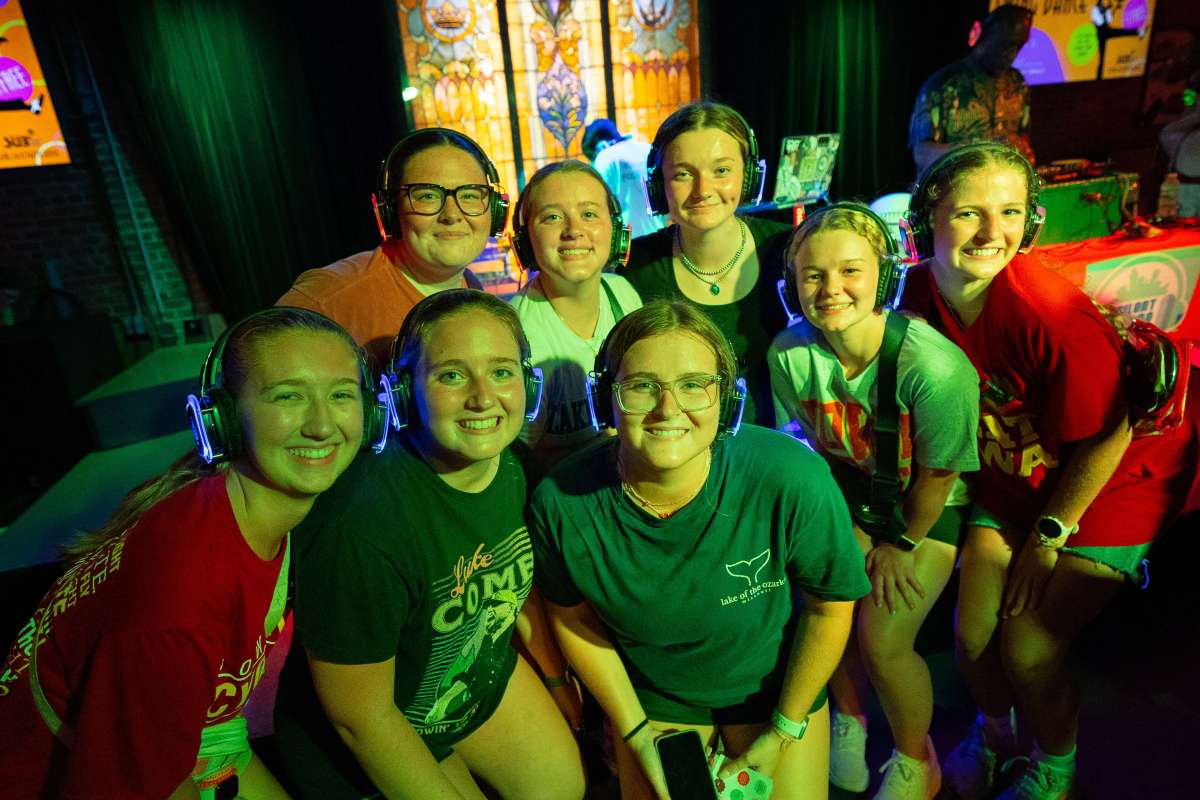 A group of students participates in Silent Disco in the M-Shop, Memorial Union